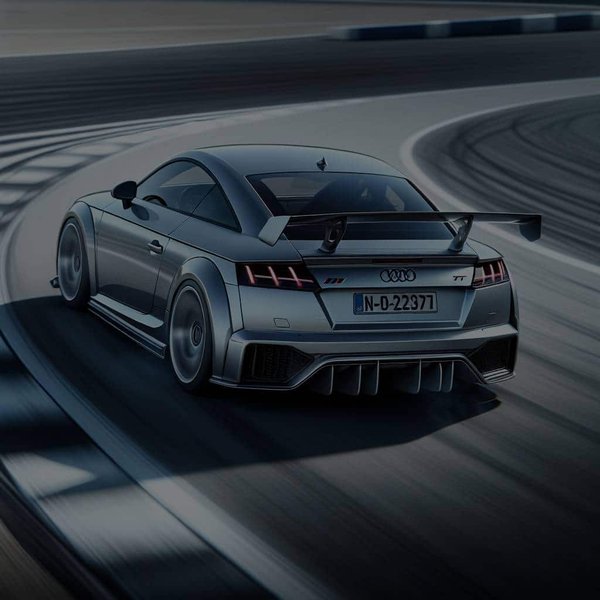 Quel est l'effet d'un spoiler arrière sur la stabilité d'une Audi TT à haute vitesse?